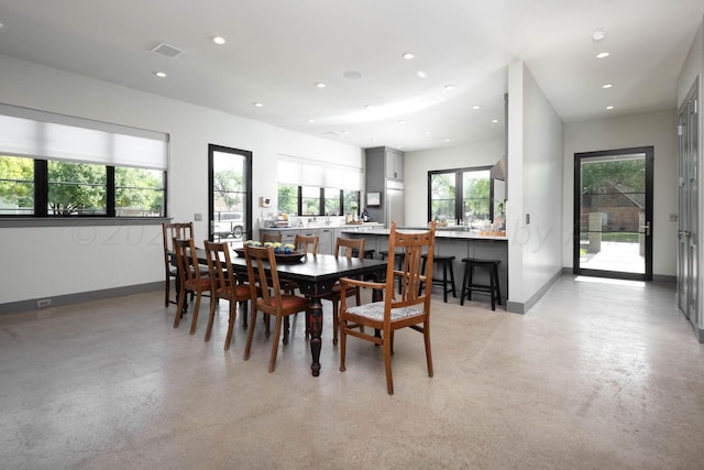 1600 S Milam St, Amarillo, TX 79102 - dining area featuring recessed lighting, baseboards, and concrete flooring