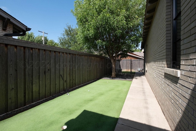 1600 S Milam St, Amarillo, TX 79102 - fenced backyard featuring a putting area