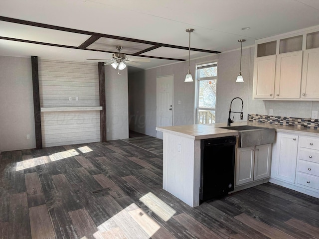 6 Honeywood Pl, Dalhart, TX 79023 - kitchen featuring dark wood-style flooring, a ceiling fan, a sink, and black dishwasher