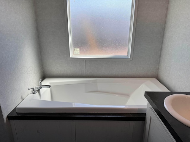 6 Honeywood Pl, Dalhart, TX 79023 - bathroom with vanity and a garden tub