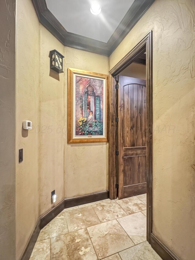 38 Merion Pl, Amarillo, TX 79124 - hallway with stone tile flooring, ornamental molding, and a textured wall