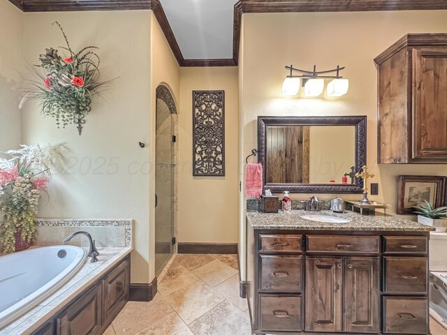 38 Merion Pl, Amarillo, TX 79124 - full bathroom featuring crown molding, a bath, vanity, a shower stall, and stone tile floors