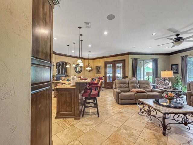 38 Merion Pl, Amarillo, TX 79124 - living area featuring ornamental molding, a textured wall, ceiling fan, recessed lighting, and french doors