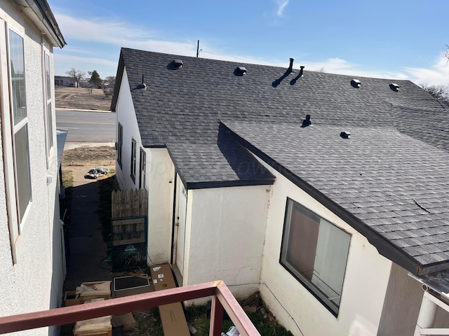 525 SE 2nd St, Tulia, TX 79088 - rear view of house with a shingled roof