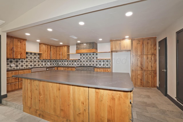 3801 Deann Dr, Amarillo, TX 79121 - kitchen featuring open shelves, custom exhaust hood, dark countertops, stove, and a spacious island