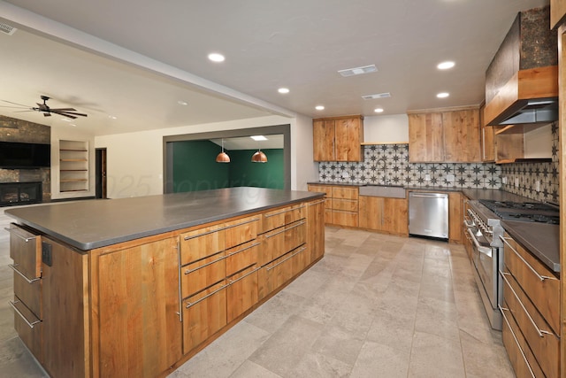 3801 Deann Dr, Amarillo, TX 79121 - kitchen with appliances with stainless steel finishes, custom range hood, dark countertops, tasteful backsplash, and ceiling fan