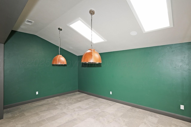 3801 Deann Dr, Amarillo, TX 79121 - unfurnished room with a skylight and vaulted ceiling