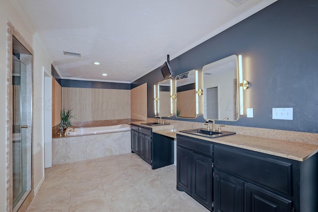 3801 Deann Dr, Amarillo, TX 79121 - bathroom featuring vanity, ornamental molding, a garden tub, and a stall shower