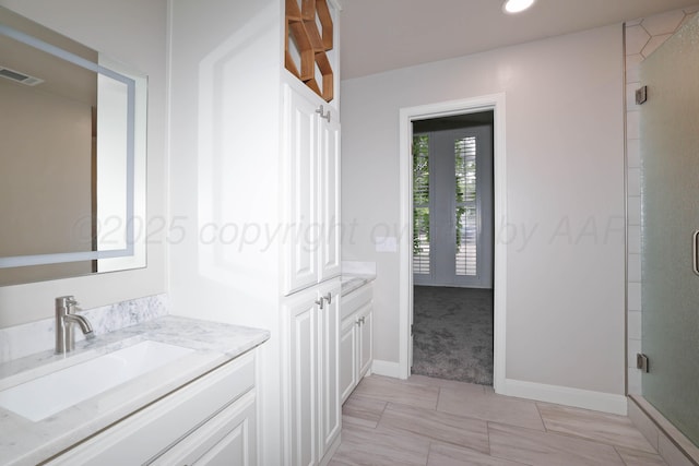 3801 Deann Dr, Amarillo, TX 79121 - full bath featuring vanity, a stall shower, and recessed lighting