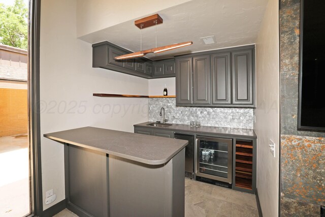 3801 Deann Dr, Amarillo, TX 79121 - indoor wet bar with beverage cooler and backsplash
