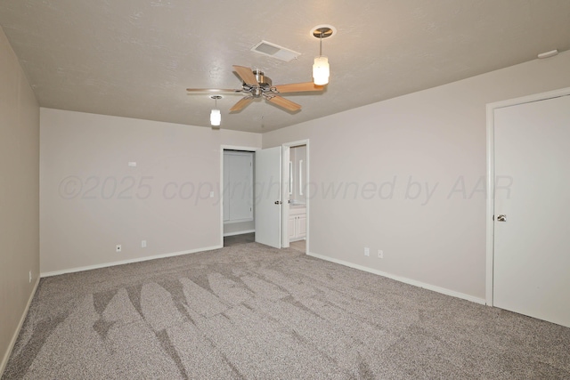 3801 Deann Dr, Amarillo, TX 79121 - unfurnished bedroom featuring carpet, a ceiling fan, and ensuite bathroom