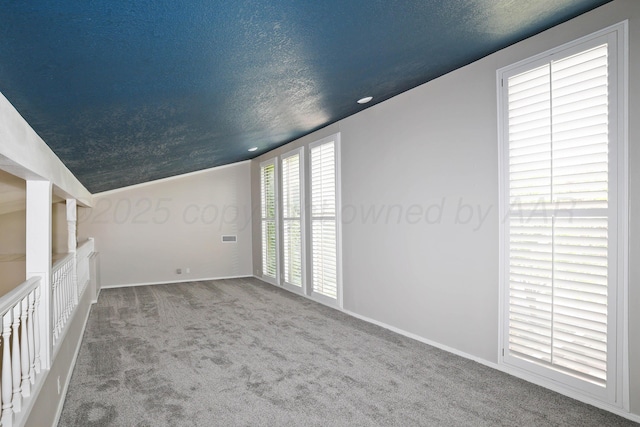 3801 Deann Dr, Amarillo, TX 79121 - carpeted spare room featuring baseboards and lofted ceiling