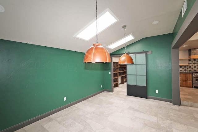 3801 Deann Dr, Amarillo, TX 79121 - empty room with lofted ceiling, a barn door, and a skylight