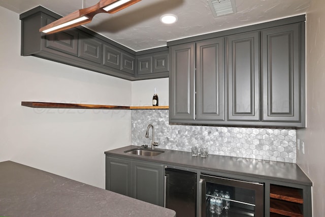 3801 Deann Dr, Amarillo, TX 79121 - indoor wet bar with beverage cooler, backsplash, and refrigerator