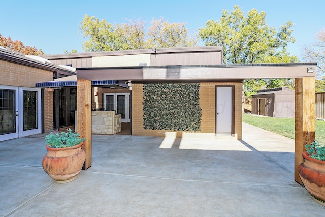 3801 Deann Dr, Amarillo, TX 79121 - view of patio with a shed and french doors