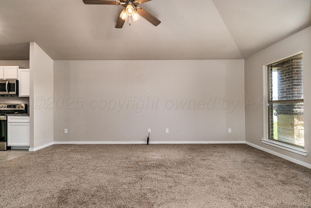 5004 Hinson St, Amarillo, TX 79118 - unfurnished living room with light colored carpet, vaulted ceiling, and ceiling fan