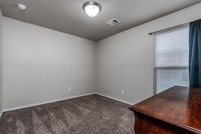 606 Elgin St, Amarillo, TX 79118 - unfurnished office with carpet flooring and baseboards