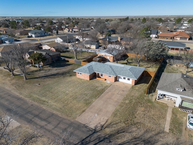 birds eye view of property with a residential view