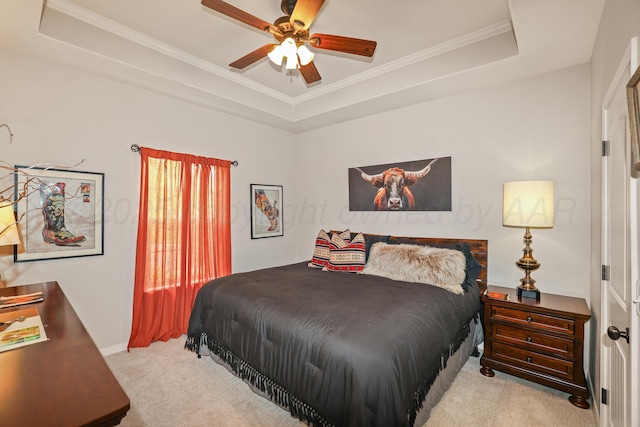7404 Southbend Dr, Amarillo, TX 79119 - bedroom featuring light colored carpet, a tray ceiling, crown molding, and ceiling fan
