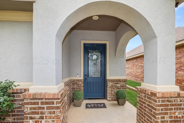 7404 Southbend Dr, Amarillo, TX 79119 - view of exterior entry with brick siding and stucco siding