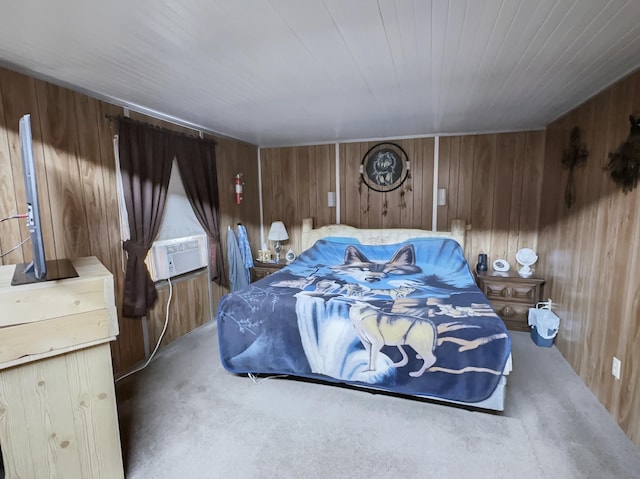 bedroom featuring wood walls and concrete flooring