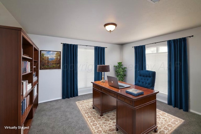 office area featuring light colored carpet and baseboards