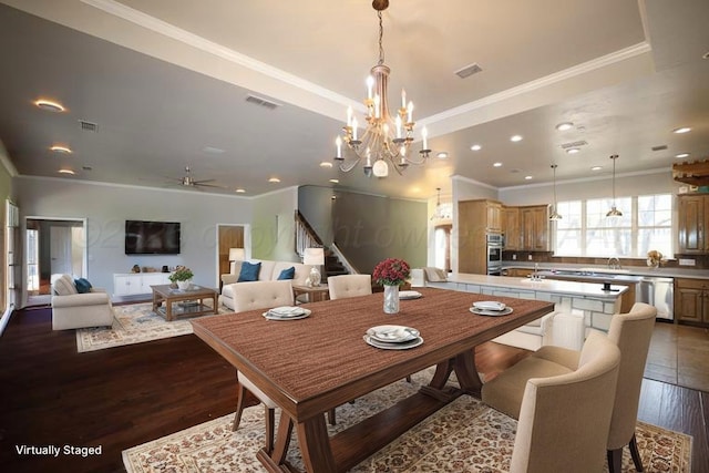 dining area with dark wood-style floors, visible vents, recessed lighting, stairs, and ornamental molding