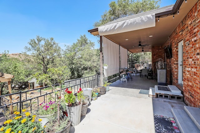 view of patio with ceiling fan