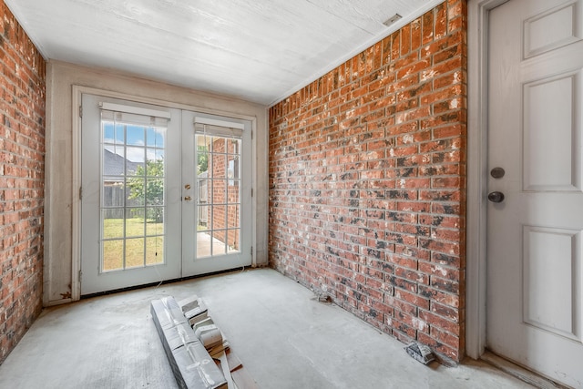 6100 Mckay Ct, Amarillo, TX 79118 - doorway to outside featuring brick wall, healthy amount of natural light, and french doors