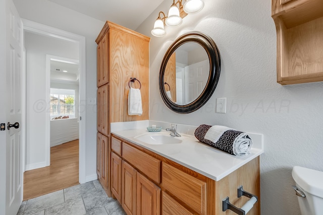 6100 Mckay Ct, Amarillo, TX 79118 - bathroom with vanity and toilet