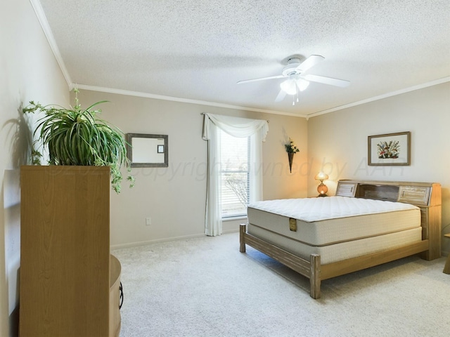 bedroom with crown molding, light carpet, and a textured ceiling