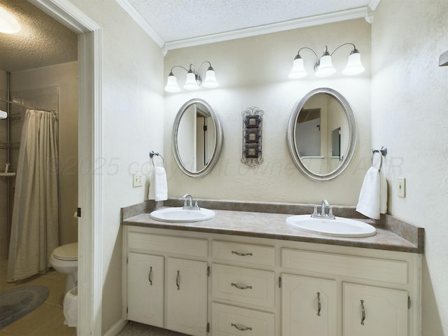 bathroom featuring tile patterned flooring, vanity, ornamental molding, a textured ceiling, and toilet