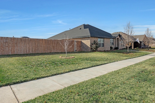 exterior space with a front yard