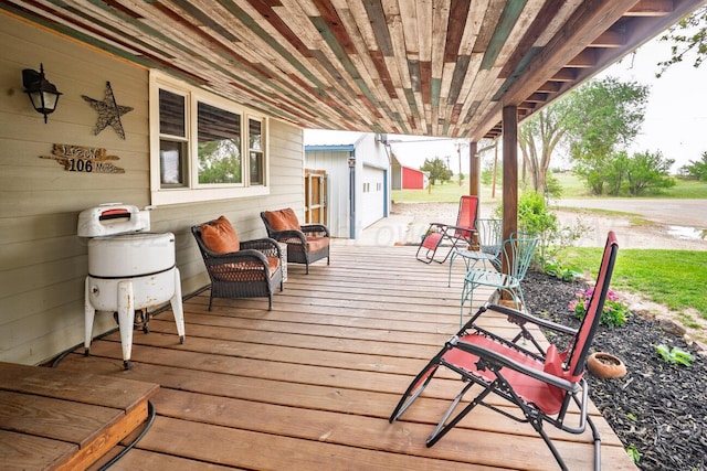 deck with an outdoor structure