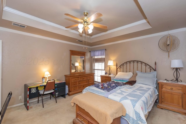 6702 Opal Ct, Amarillo, TX 79124 - bedroom with a tray ceiling, light colored carpet, a ceiling fan, and ornamental molding
