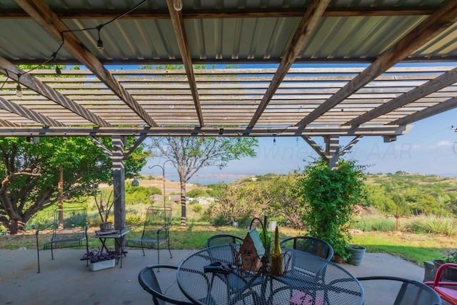 view of patio featuring a pergola