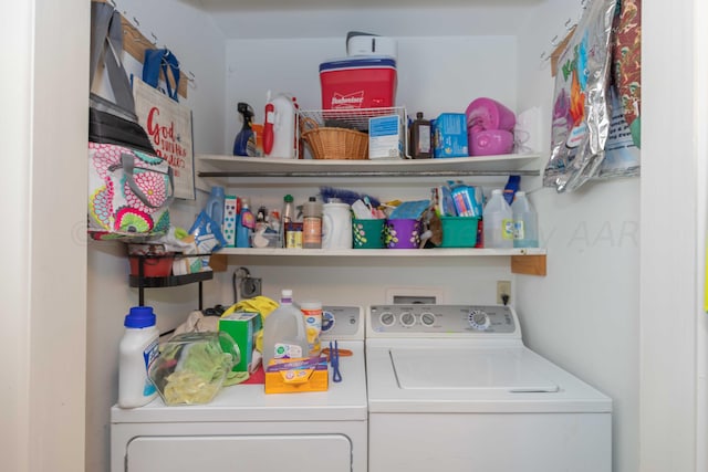 washroom with independent washer and dryer