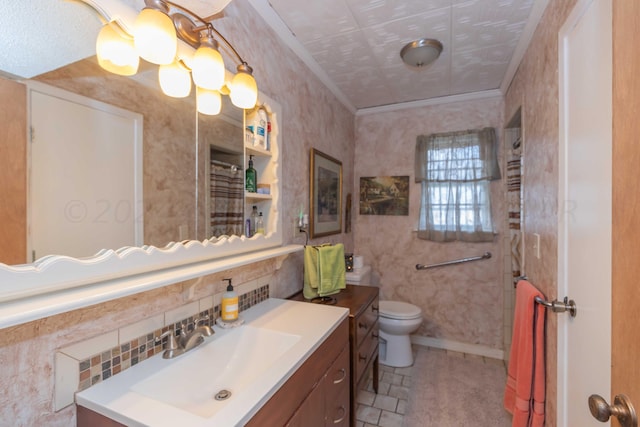 bathroom with toilet and vanity