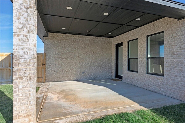 view of patio with fence