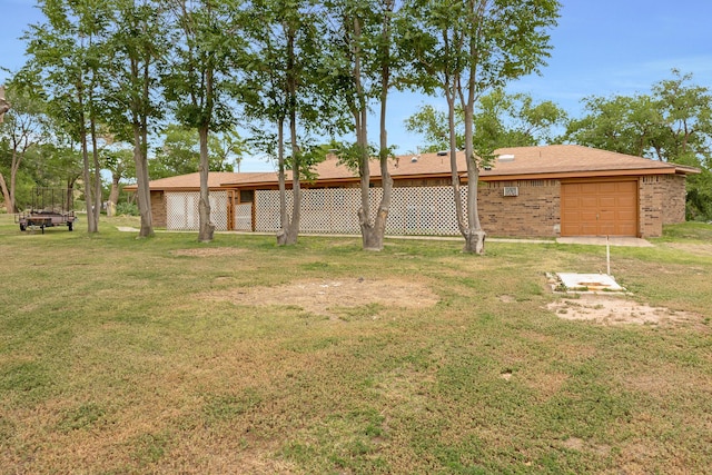 view of yard featuring a garage