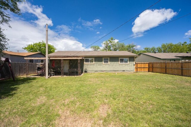 rear view of house featuring a patio