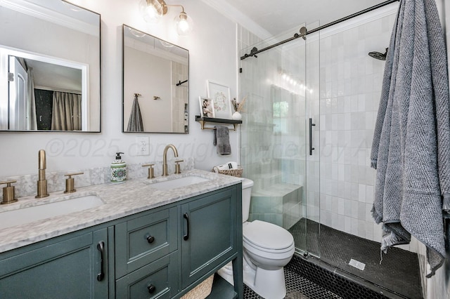 501 Sunset Ter, Amarillo, TX 79106 - bathroom featuring a stall shower, toilet, double vanity, and ornamental molding