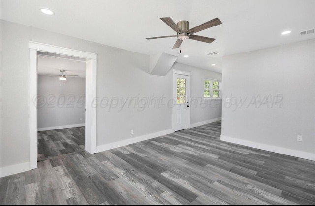 empty room with ceiling fan, wood finished floors, baseboards, and recessed lighting