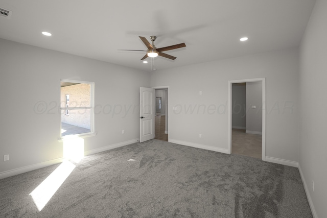 unfurnished bedroom featuring ceiling fan and carpet floors