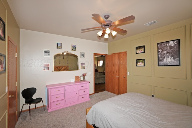 1206 Olive St, Stratford, TX 79084 - bedroom with carpet flooring and a ceiling fan