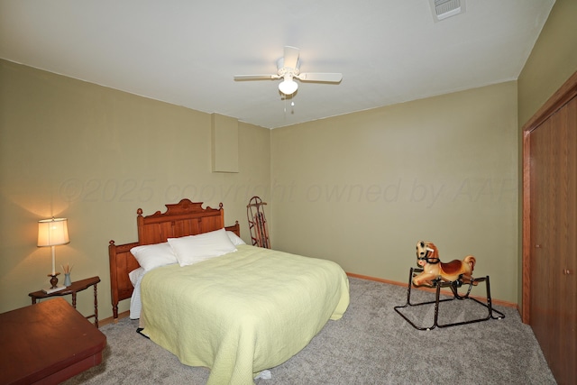 1206 Olive St, Stratford, TX 79084 - carpeted bedroom with a closet and a ceiling fan