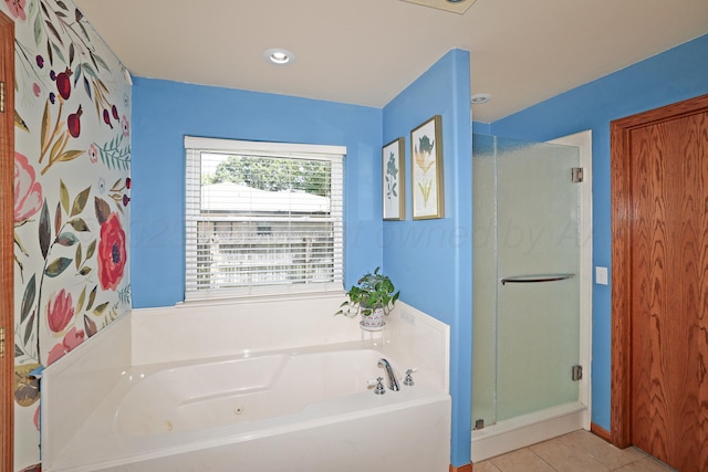 1206 Olive St, Stratford, TX 79084 - bathroom with a stall shower, a whirlpool tub, and tile patterned floors