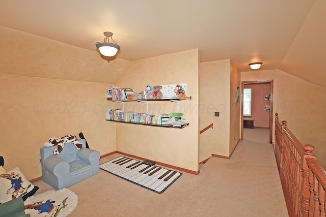 1206 Olive St, Stratford, TX 79084 - living area with an upstairs landing, vaulted ceiling, and carpet flooring