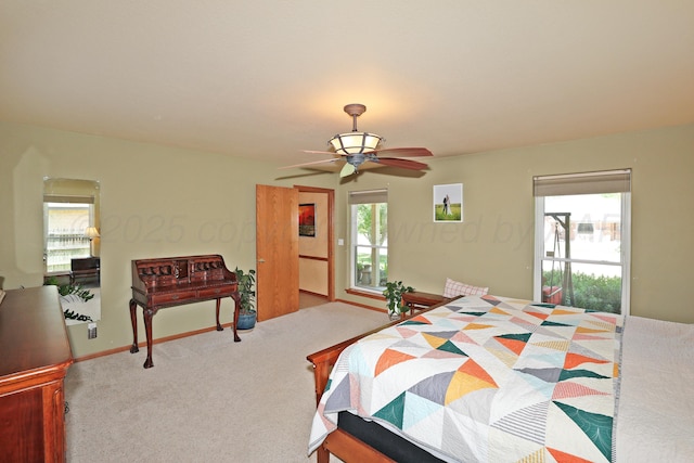1206 Olive St, Stratford, TX 79084 - bedroom with ceiling fan and carpet floors