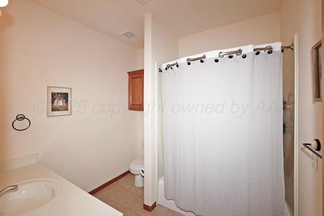 1206 Olive St, Stratford, TX 79084 - full bathroom with tile patterned floors, shower / tub combo, and vanity